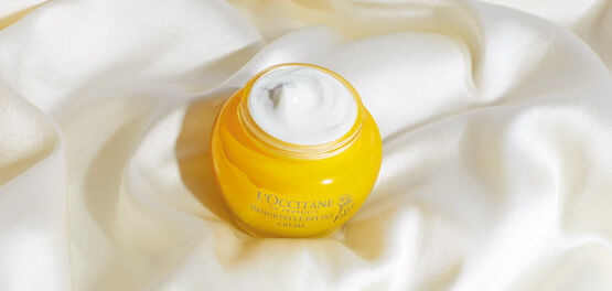 Divine cream sitting on silk fabric